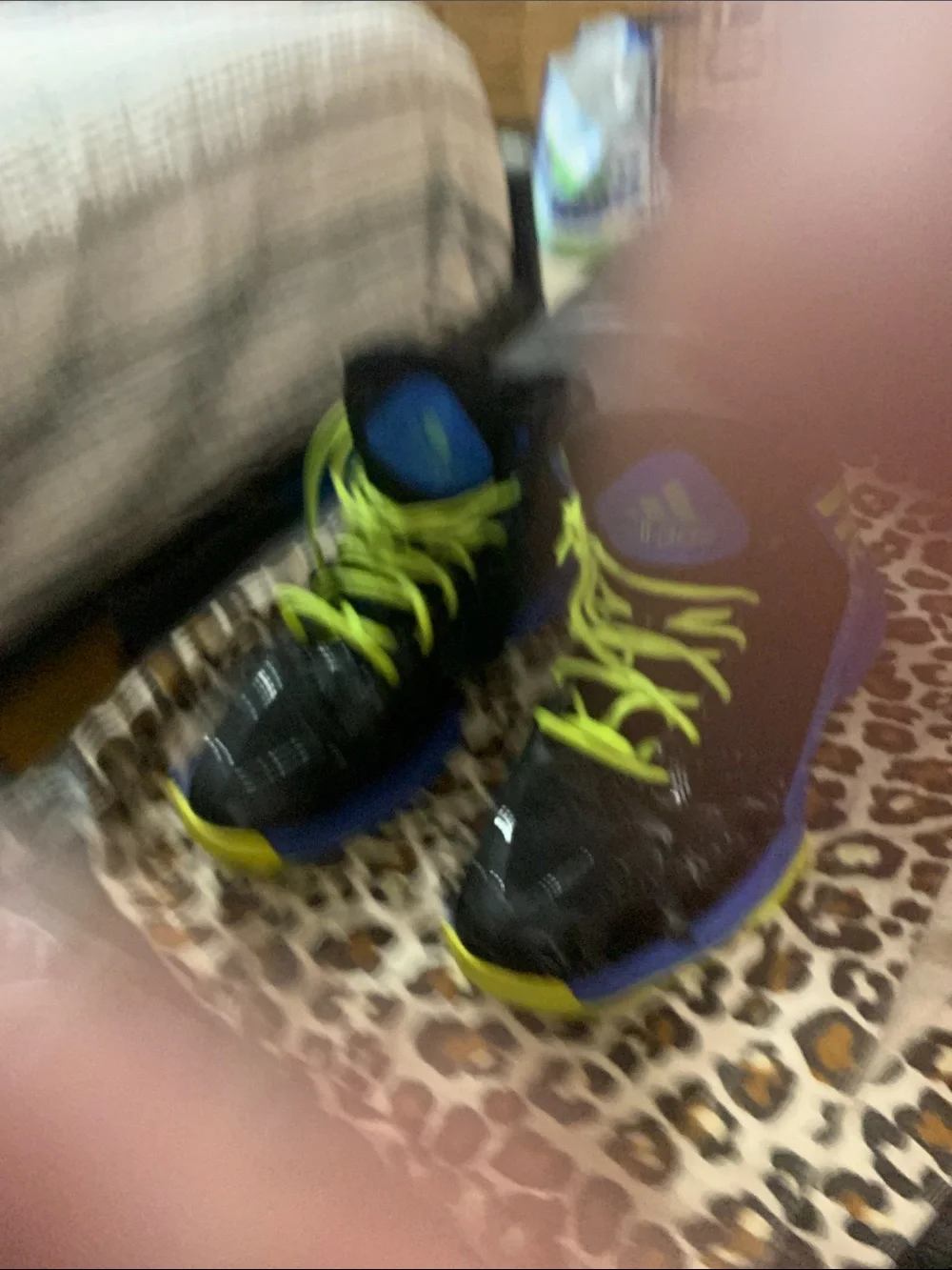 Black and Blue High-Top Athletic Shoes with Neon Yellow Laces